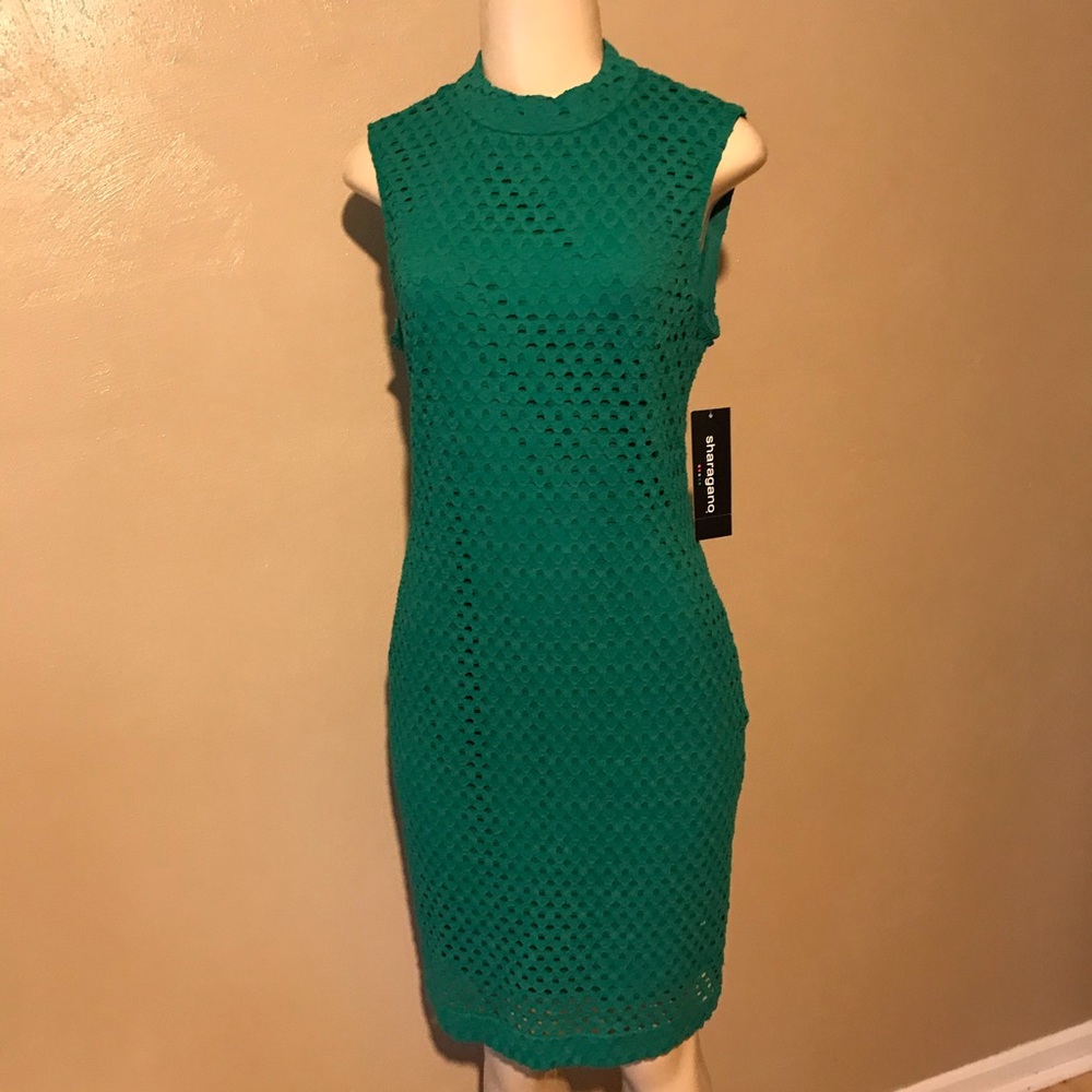 Sharagano green lace dress size 4,lined stretchy